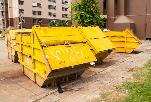 Construction site with waste containers in Soho